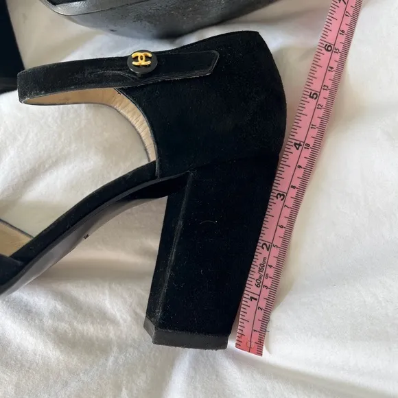 Authentic Chanel suede heels with strap.