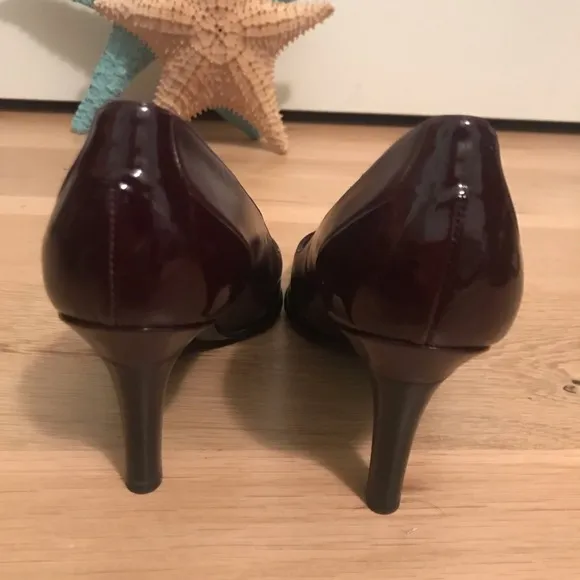 Bruno Magli NWOT deep wine/oxblood pumps.