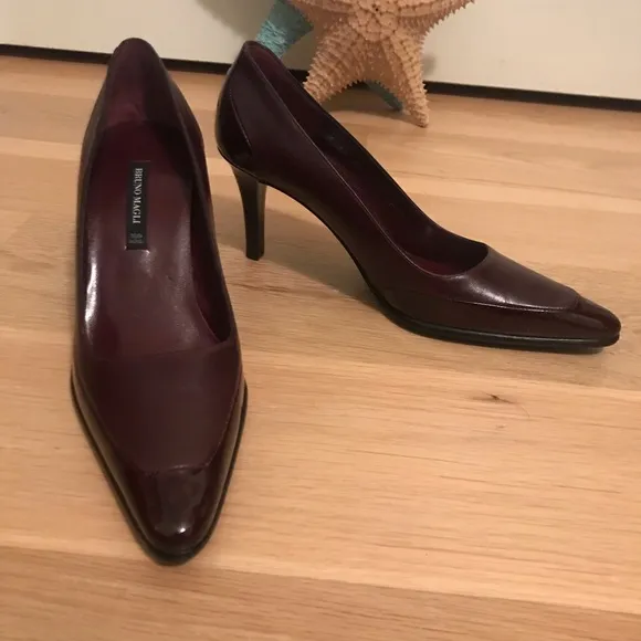 Bruno Magli NWOT deep wine/oxblood pumps.