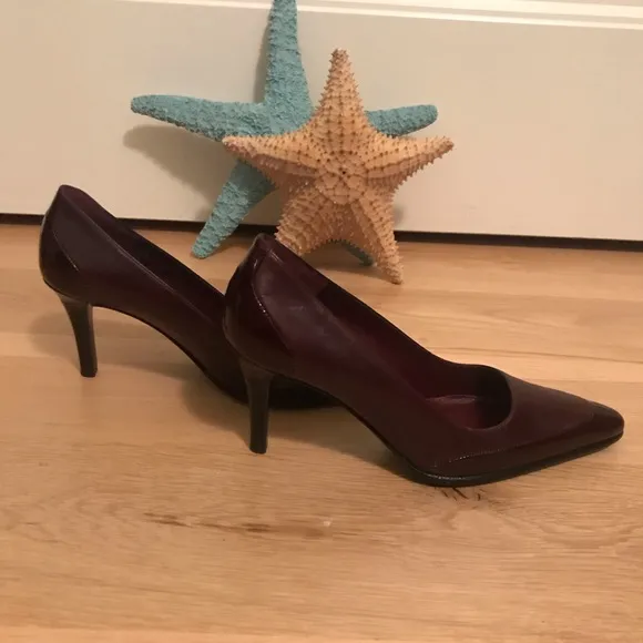 Bruno Magli NWOT deep wine/oxblood pumps.