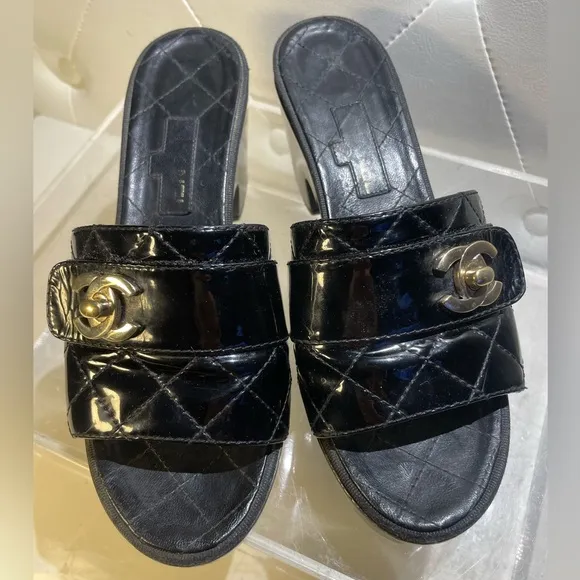 CHANEL tumlock CC logo black gold hardware quilted leather mules plaform