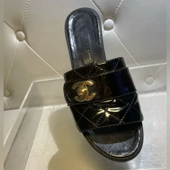 CHANEL tumlock CC logo black gold hardware quilted leather mules plaform