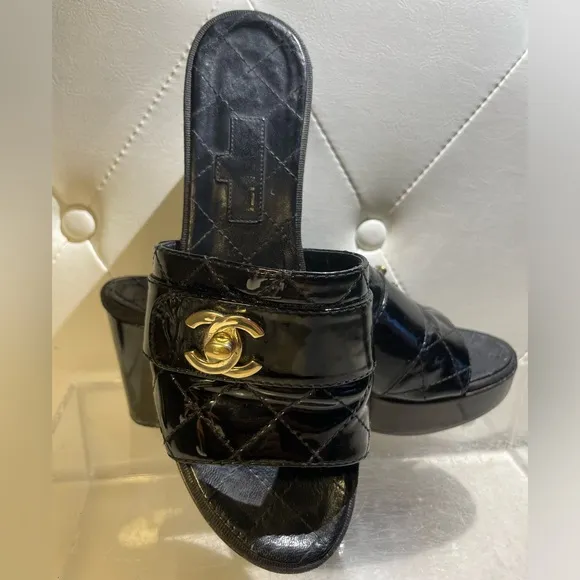 CHANEL tumlock CC logo black gold hardware quilted leather mules plaform