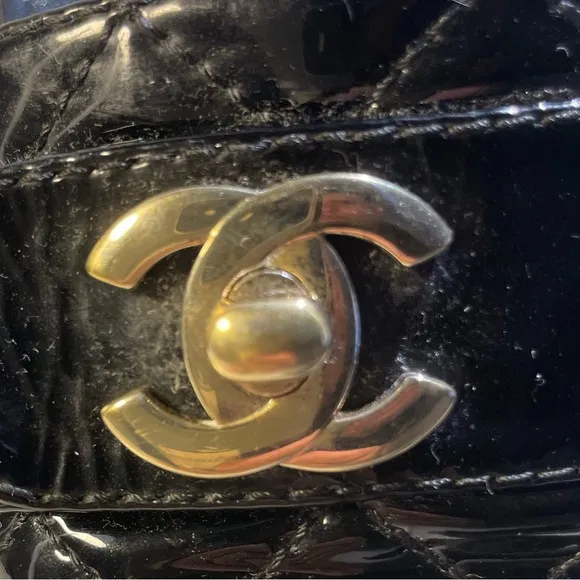 CHANEL tumlock CC logo black gold hardware quilted leather mules plaform