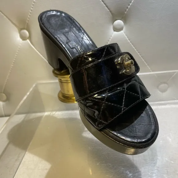 CHANEL tumlock CC logo black gold hardware quilted leather mules plaform