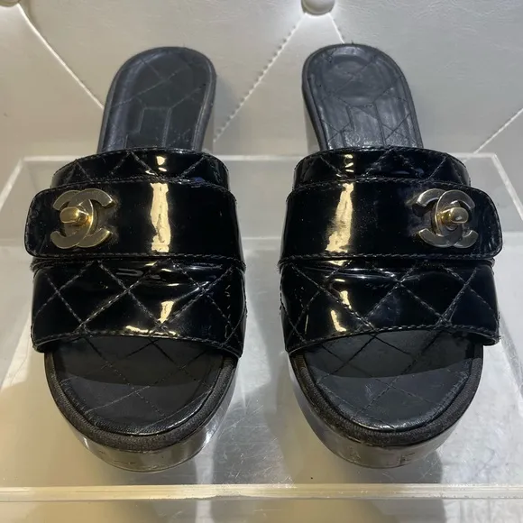 CHANEL tumlock CC logo black gold hardware quilted leather mules plaform