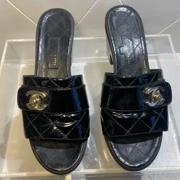 CHANEL tumlock CC logo black gold hardware quilted leather mules plaform