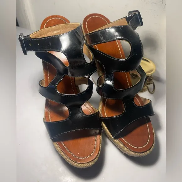 CHRISTIAN LOUBOUTIN Black patent leather cut out wedge sandals sz 37