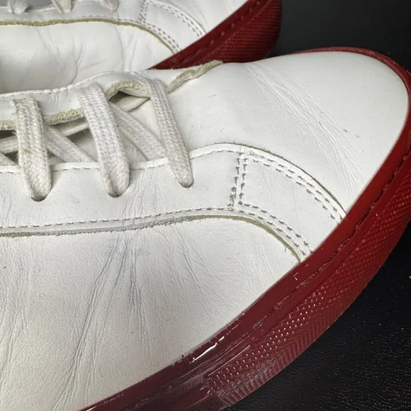 Common Projects White with Red patent soles.  Men's Sneakers size 42