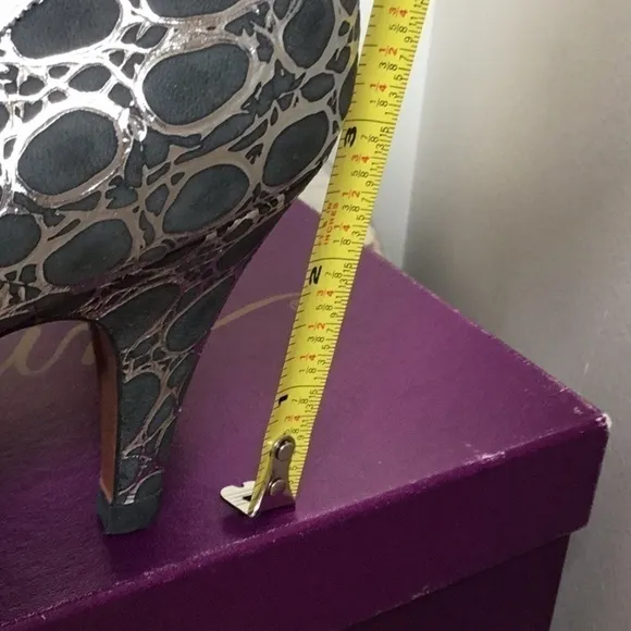 GAROLINI silver and black high heel shoes. Size 7.5