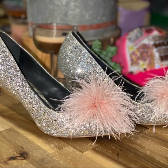 Gently used Kate Spade Marabou Pumps silver and gold glitter with pink feathers