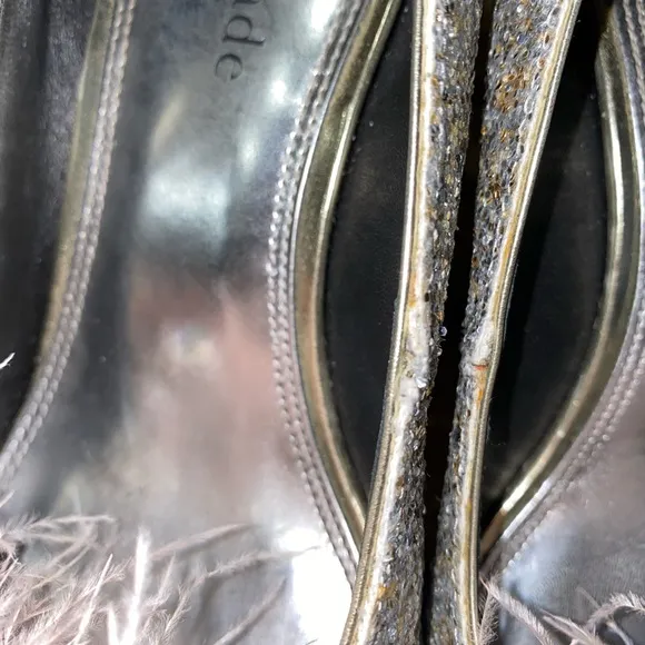 Gently used Kate Spade Marabou Pumps silver and gold glitter with pink feathers