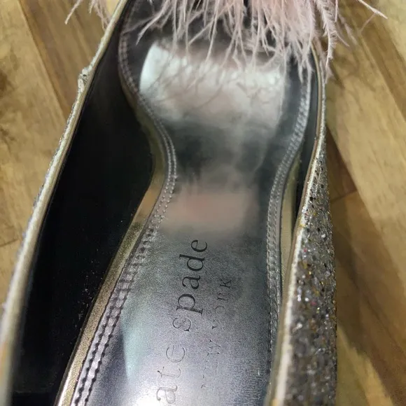 Gently used Kate Spade Marabou Pumps silver and gold glitter with pink feathers