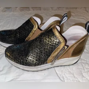 Gold and Black Athletic Shoes