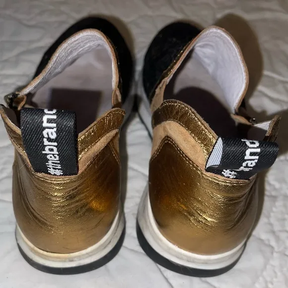 Gold and Black Athletic Shoes