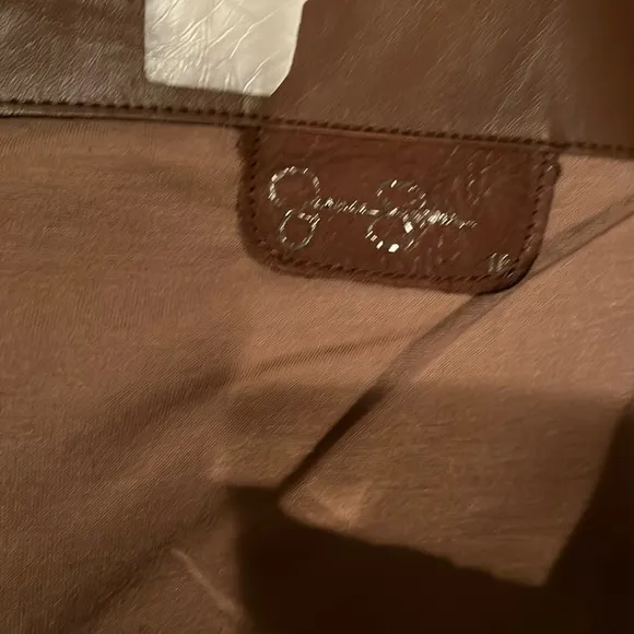 Jessica Simpson size 10 brown or cognac leather knee high boots side zipper