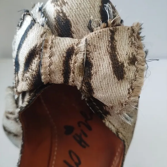 LANVIN ANIMAL PRINT PUMP'S WITH BOW