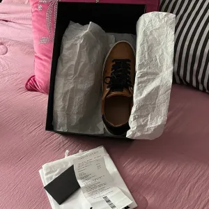 MCM Brown and Black Athletic Shoes.