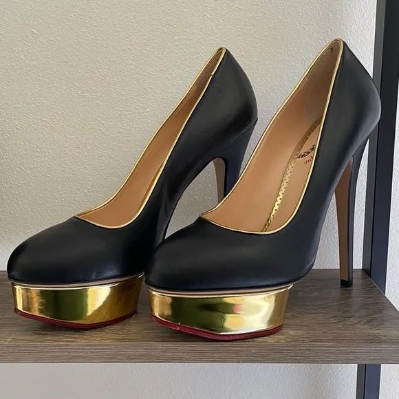 New Charlotte Olympia black and gold platform pumps