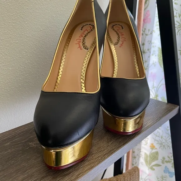 New Charlotte Olympia black and gold platform pumps