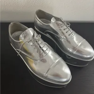 Prada Silver Platform Oxfords with Metallic Finish. Authentic