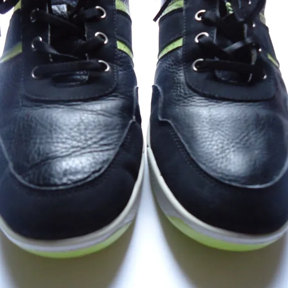 SIZE 12. FOOTJOY Contour casual spikeless leather golf shoes.