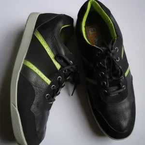 SIZE 12. FOOTJOY Contour casual spikeless leather golf shoes.