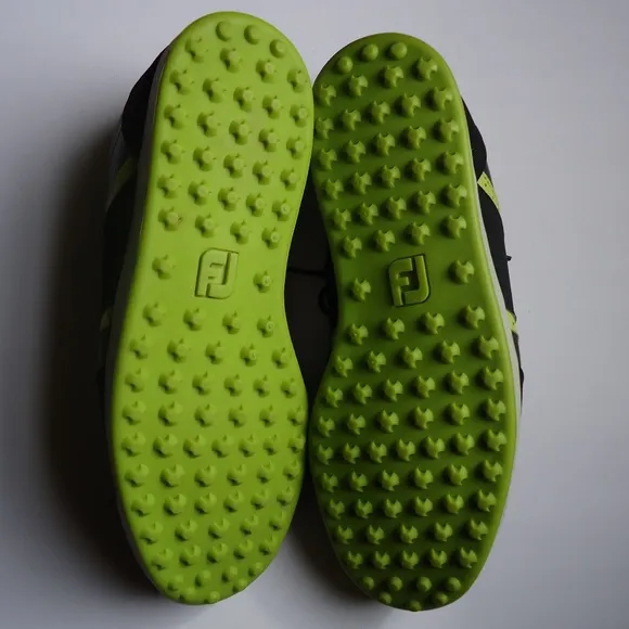 SIZE 12. FOOTJOY Contour casual spikeless leather golf shoes.
