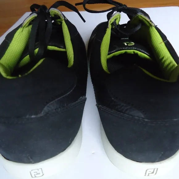 SIZE 12. FOOTJOY Contour casual spikeless leather golf shoes.