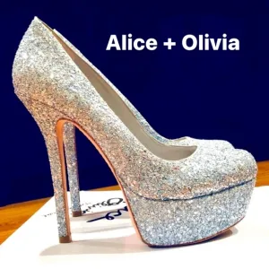 Sparkling silver Alice   Olivia stilettos, high platform, and statement heel.