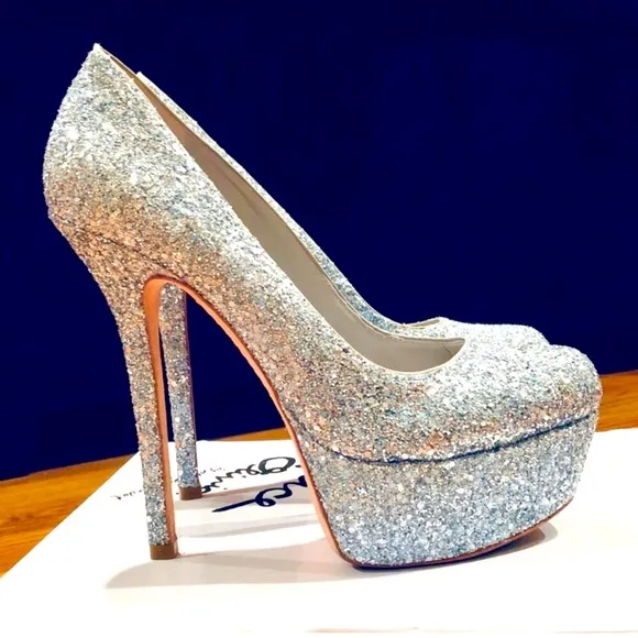 Sparkling silver Alice   Olivia stilettos, high platform, and statement heel.