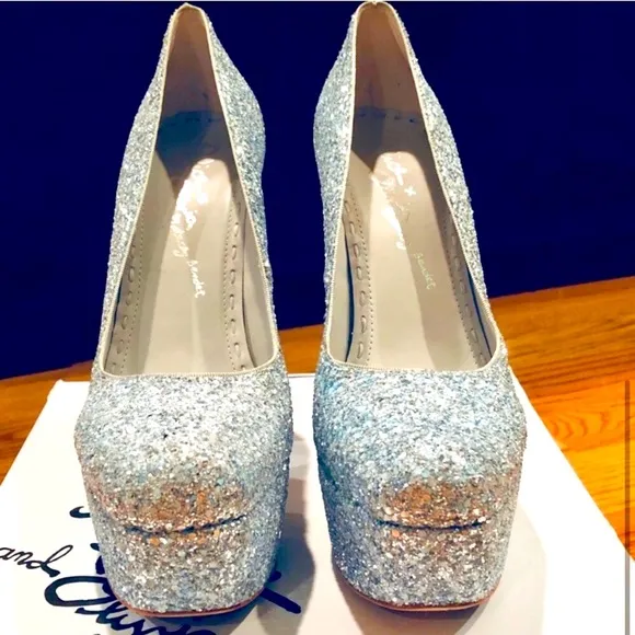 Sparkling silver Alice   Olivia stilettos, high platform, and statement heel.