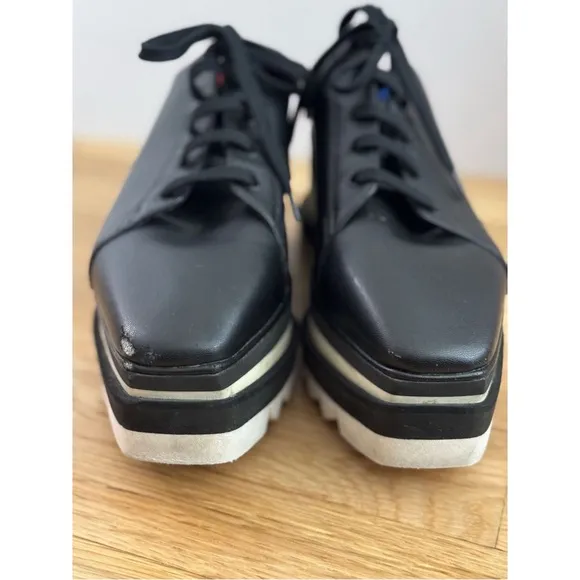 Stella McCarthy SNEAK-ELYSE PLATFORM WEDGE SNEAKER MULES IN BLACK