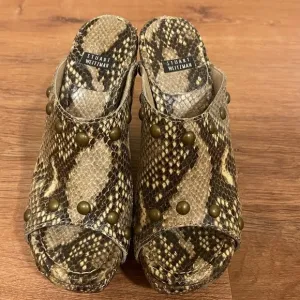 Stuart Weitzman snakeskin clog wooden heels​​​​