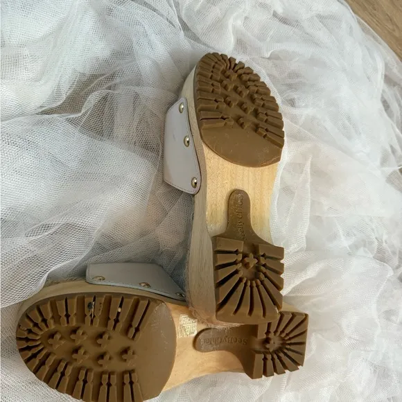 White Platform Sandals with Gold Accents.