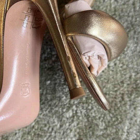 Women’s size 7 BIJOUX metallic gold heels one heel does have some blemish on it.